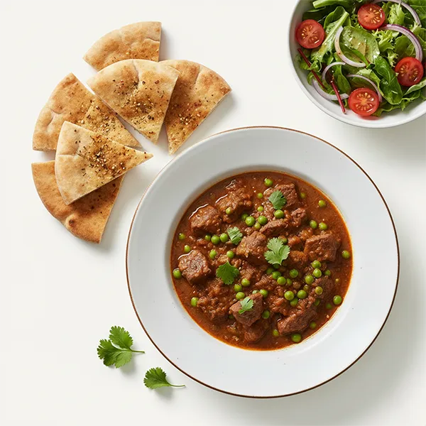 Arabic Beef & Pea Stew with whole wheat pita triangles and garden salad